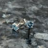 9ct White Gold Blue Topaz Claw Set Studs