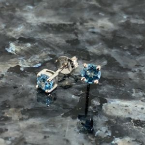 9ct White Gold Blue Topaz Claw Set Studs