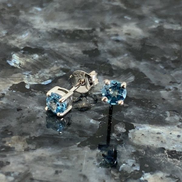 9ct White Gold Blue Topaz Claw Set Studs