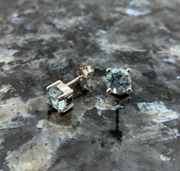 9ct White Gold Blue Topaz Claw Set Studs