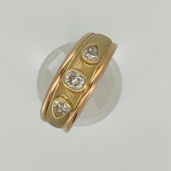 Handmade 18ct oval and pear diamond ring 0.62cts
